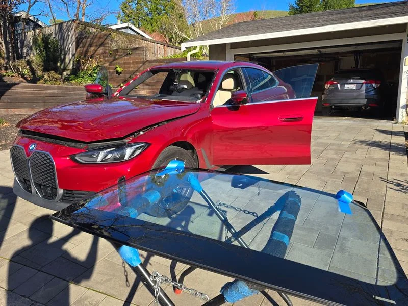 Del Mar Auto Glass technician handling glass repair